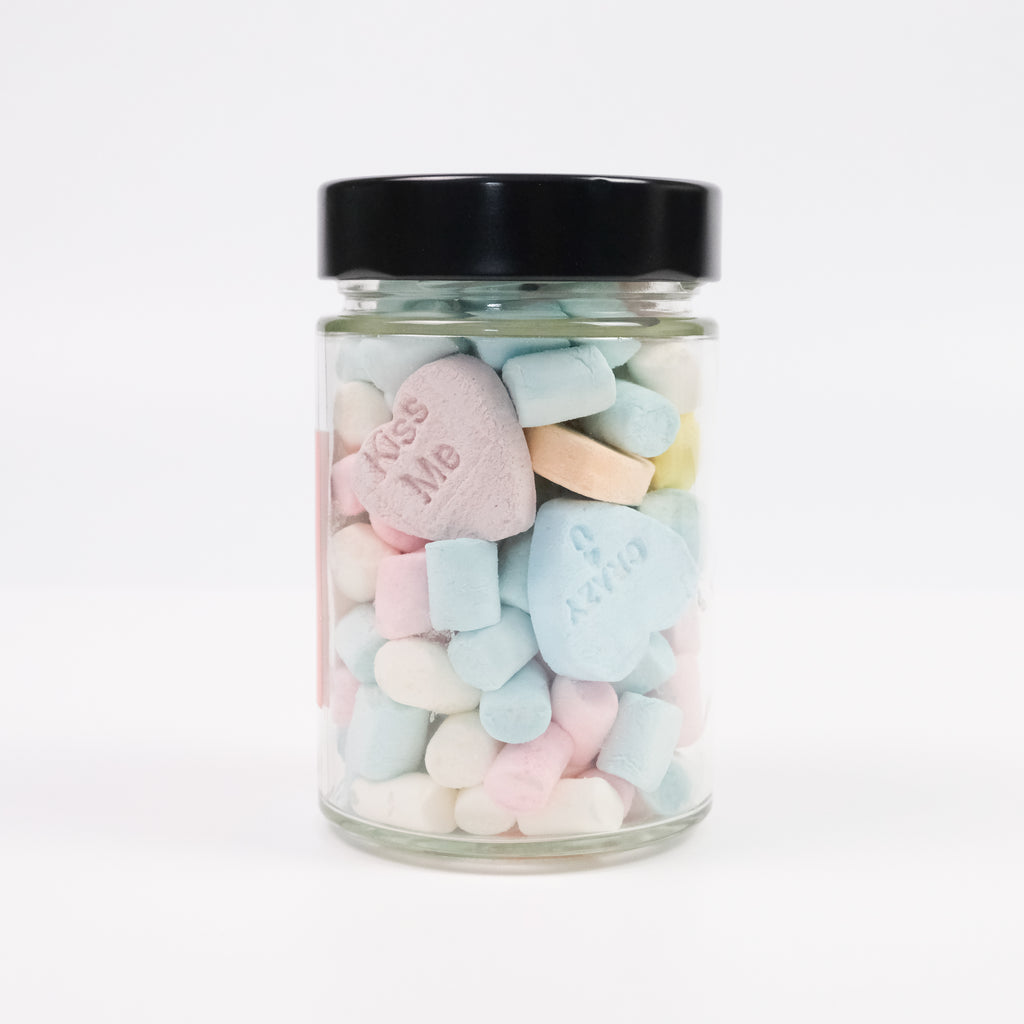 Love messages in candy jar with marshmellows
